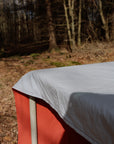 Two-coloured tablecloth Brick red/Light blue