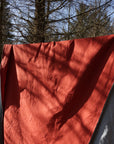 Two-coloured tablecloth Brick red/Light blue